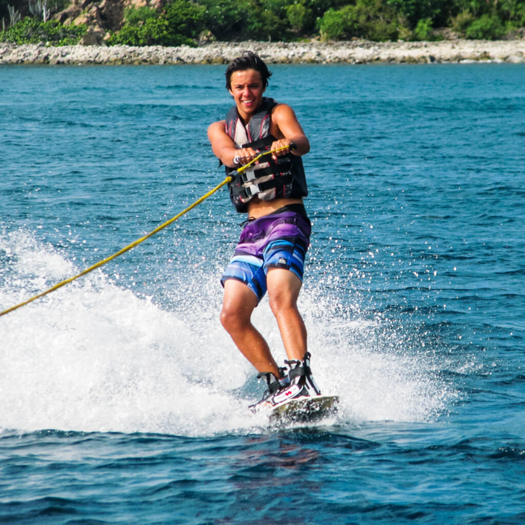 A man is water skiing.
